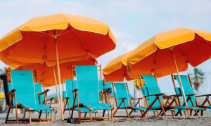 Palo de sombrilla succionador